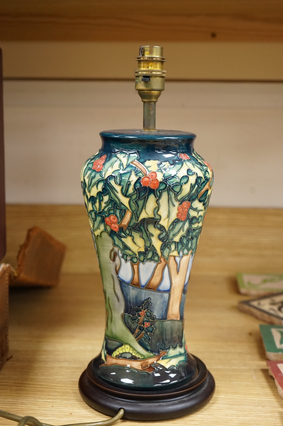A Moorcroft lamp base decorated in the Holly Hatch pattern, 37cm high including the fitting